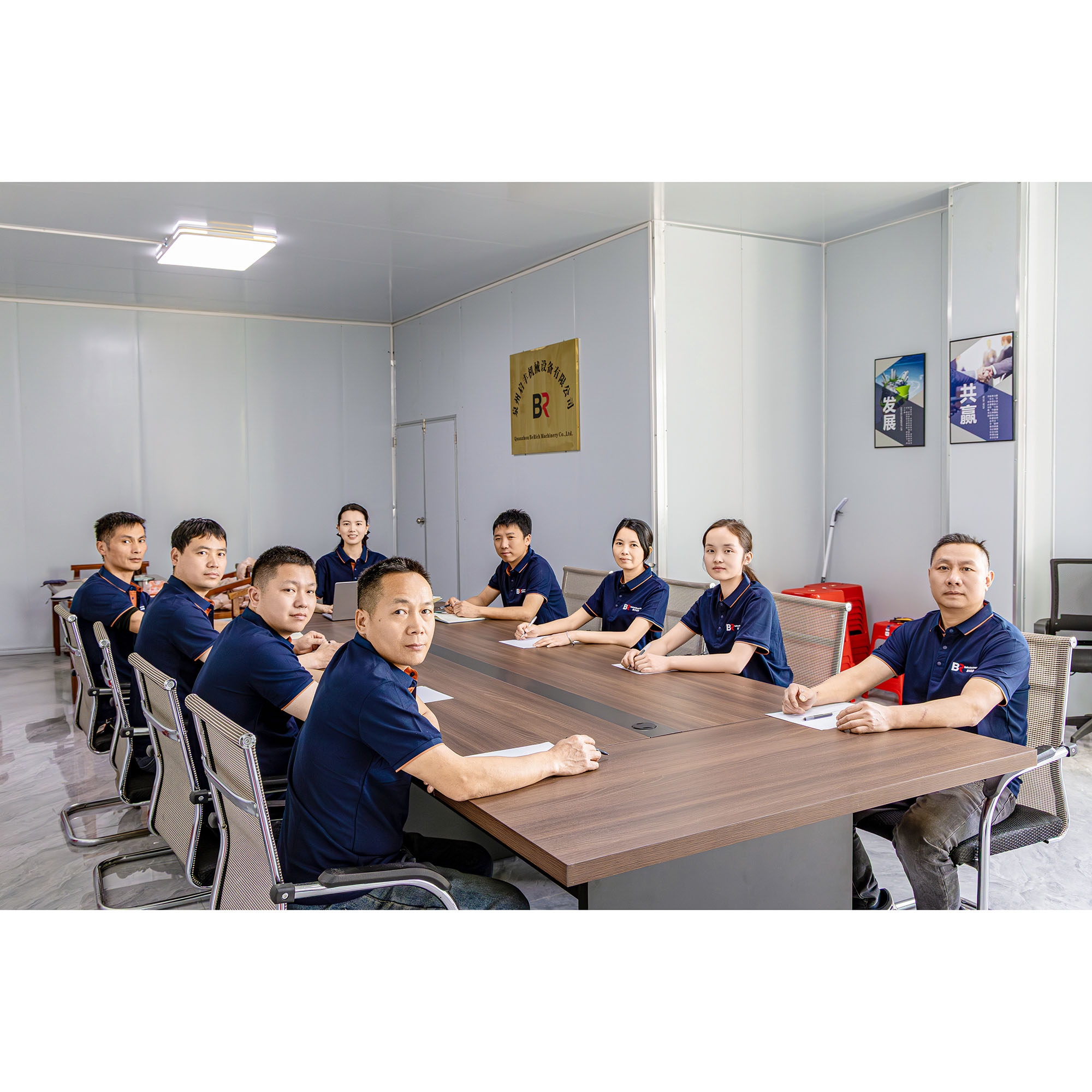 BERICH team seated around a meeting table